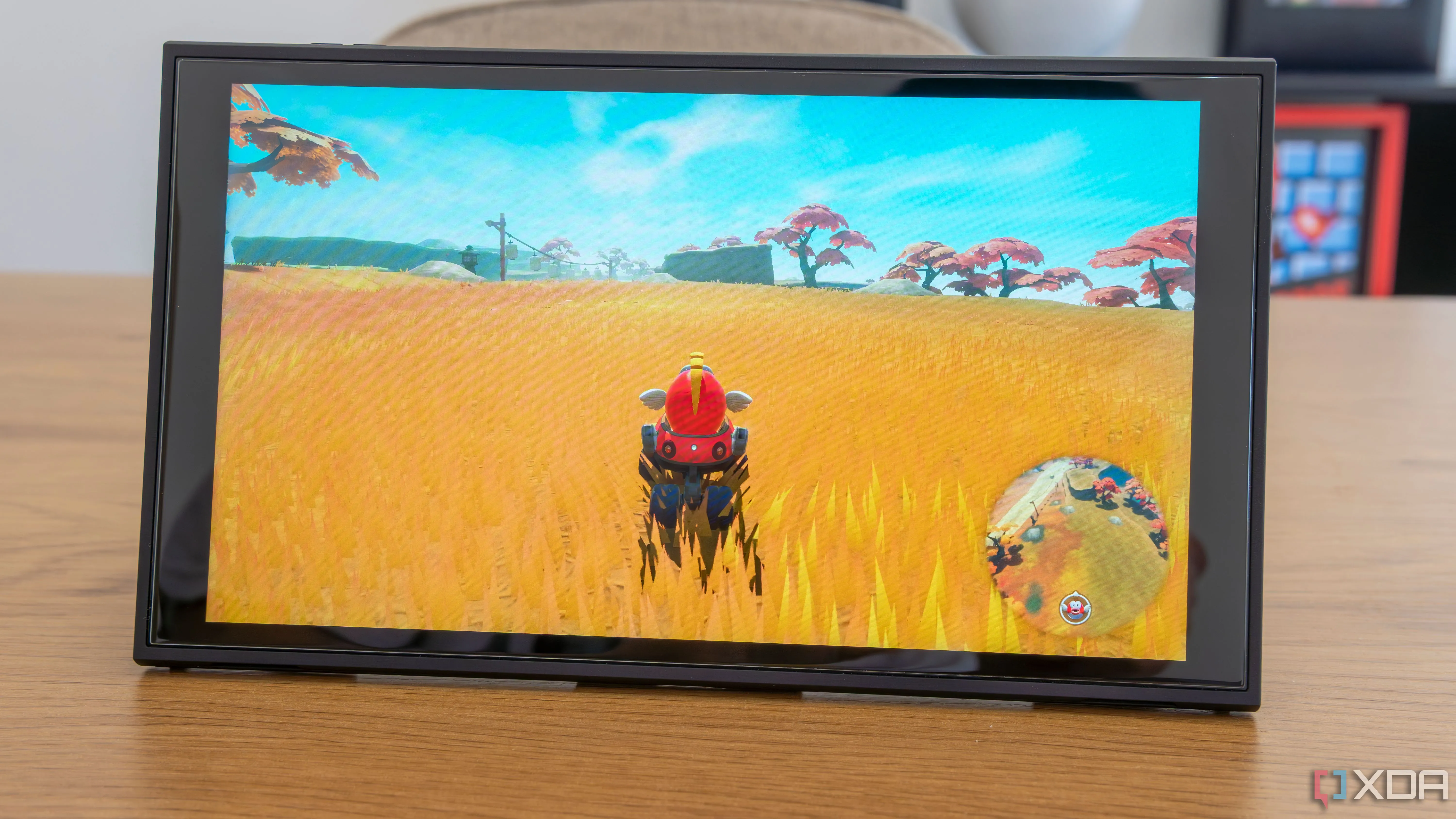 Máy Nintendo Switch 2 đang chạy tựa game Mario Kart World ở chế độ cầm tay