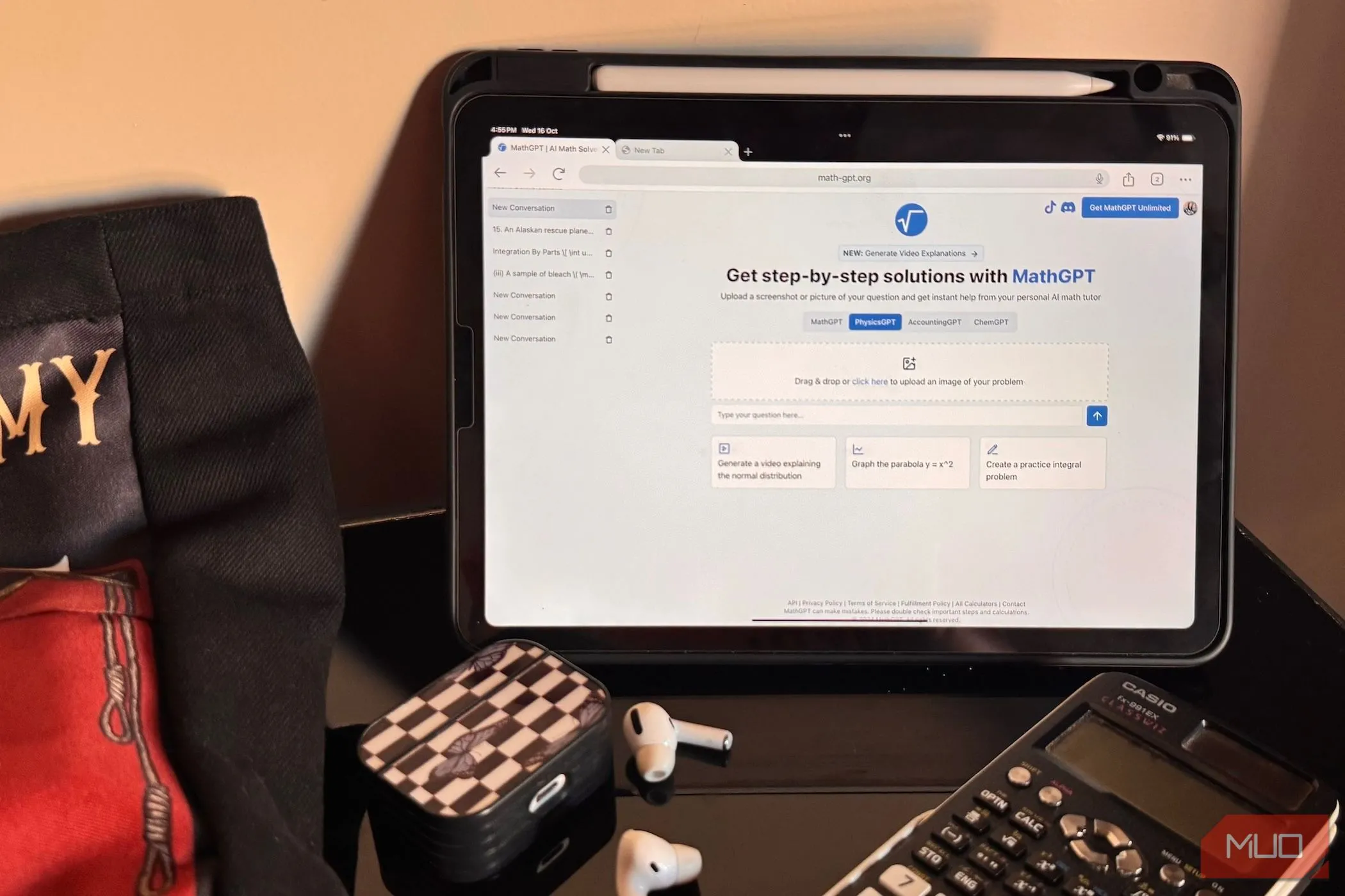 iPad hiển thị trang web MathGPT cùng với AirPods và máy tính Casio trên bàn