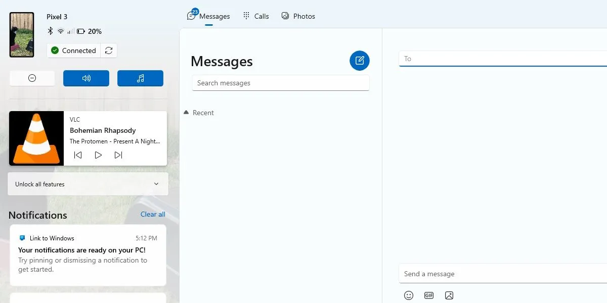 Màn hình Windows hiển thị tin nhắn từ Phone Link, với VLC đang phát nhạc