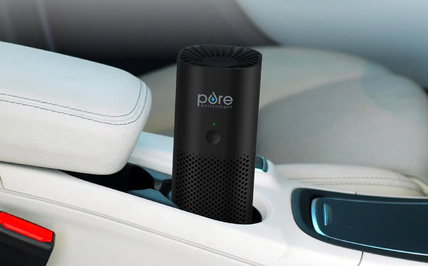 Máy lọc không khí cầm tay PureZone Mini cắm USB đặt trong hộc để cốc trên xe hơi