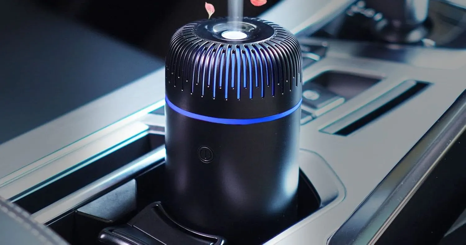 Máy tạo độ ẩm hoặc máy xông tinh dầu USB hình trụ nhỏ gọn đặt trong hộc để cốc trên ô tô