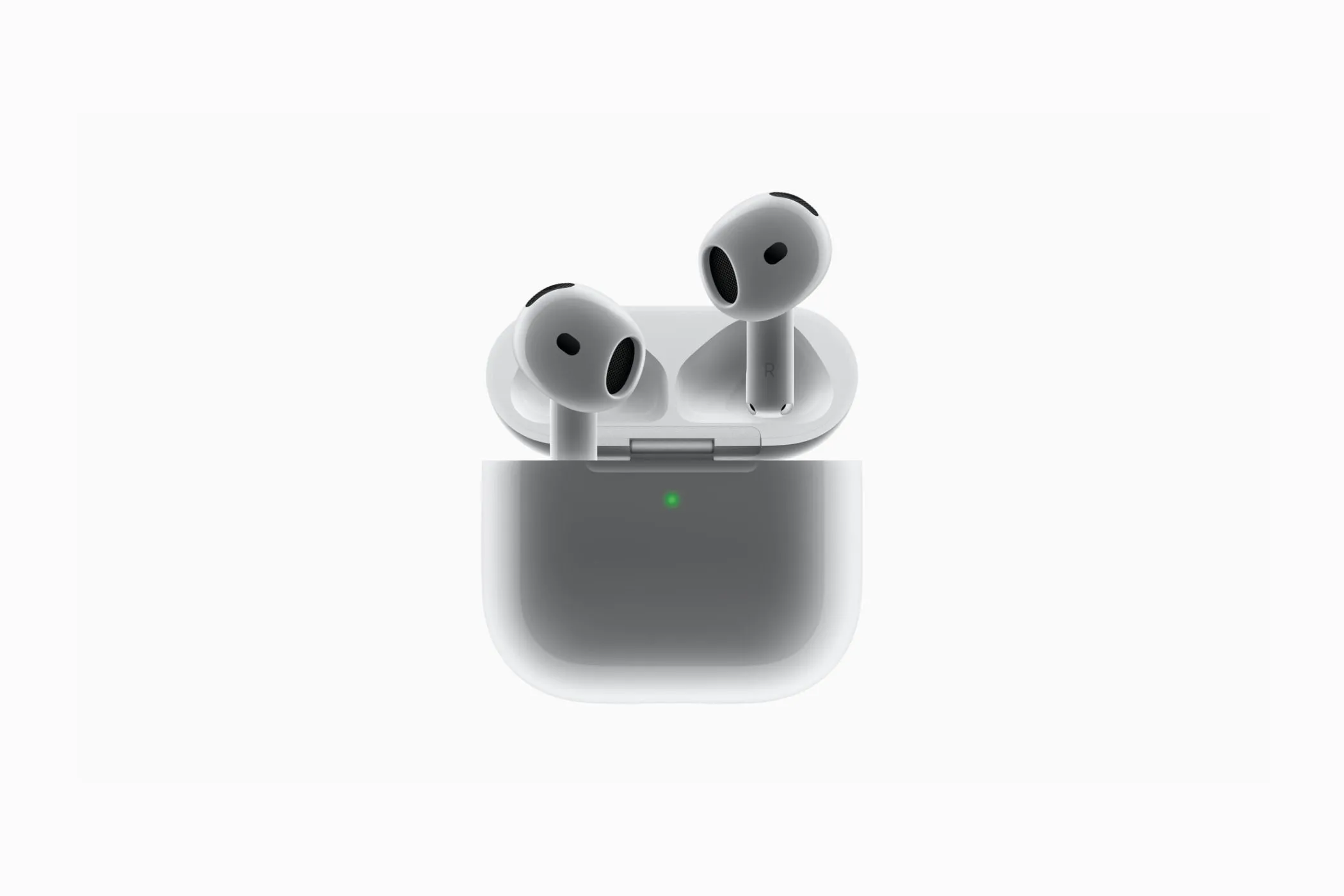 Tai nghe Apple AirPods 4 cùng hộp sạc đi kèm, cho thấy kích thước nhỏ gọn hơn so với thế hệ trước và không có nút ghép nối.