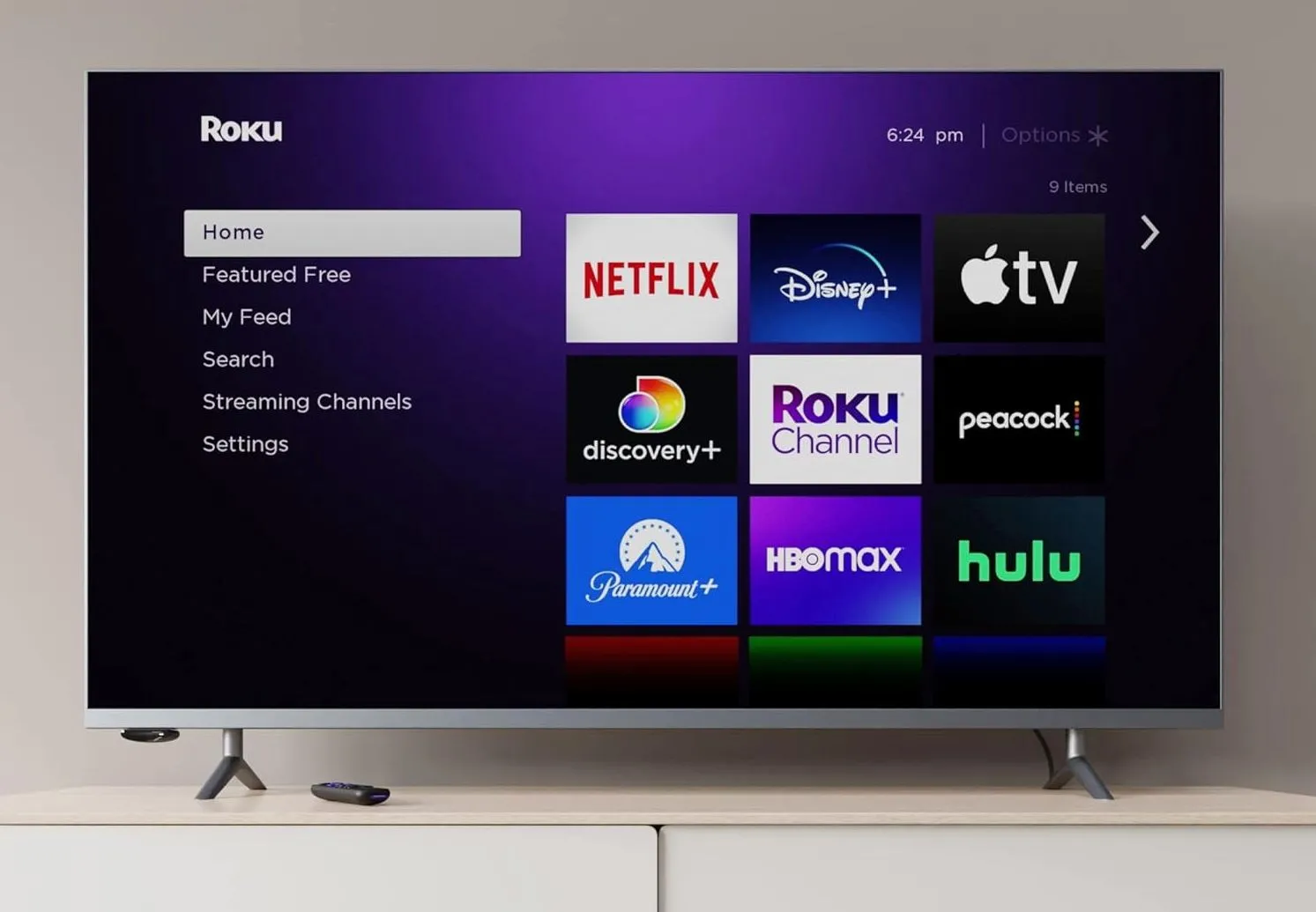 Thiết bị truyền phát Roku Express nhỏ gọn màu đen, kèm điều khiển từ xa, giúp biến TV thường thành Smart TV